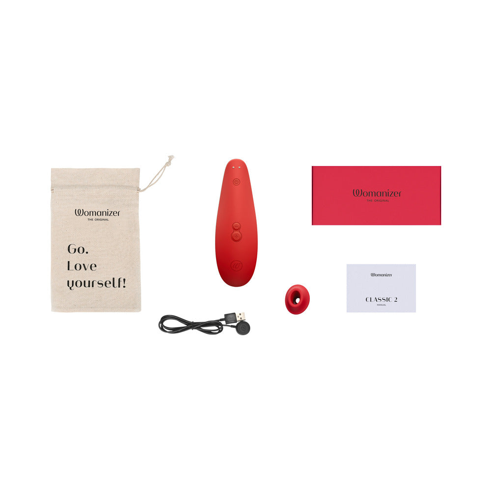 Estimulador de clítoris Pleasure Air Classic 2 Special Edition de Womanizer x Marilyn Monroe en color rojo intenso